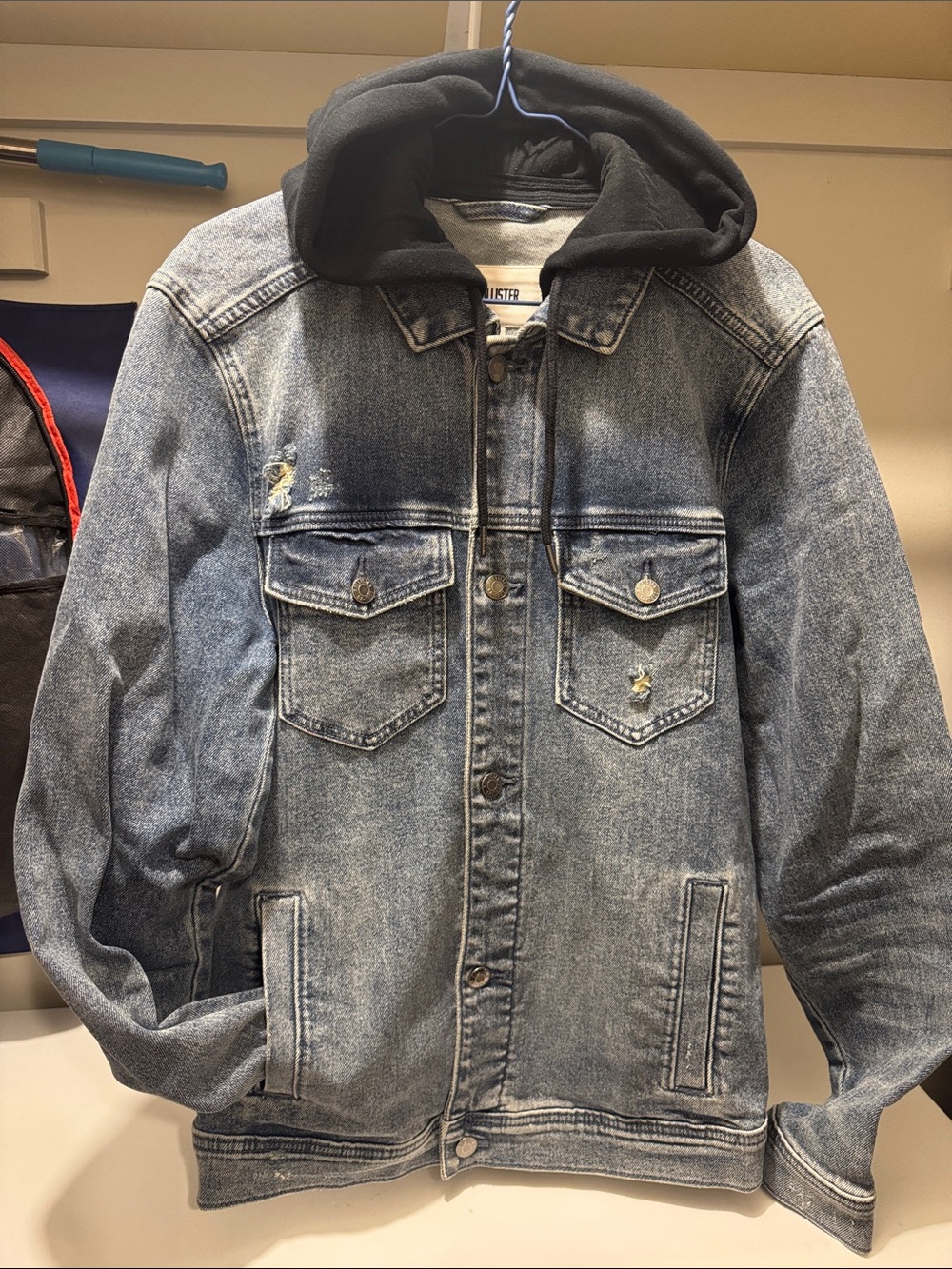 Hollister Blue Distressed Denim Jacket with Black Hood